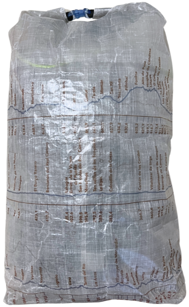 Camino de Santiago Dyneema® Clear Large Rolltop bag with Ultreiatrek design of all the towns and kilometers on the Camino Frances. Gradient is pictured in blue and names are in brown. Back View.