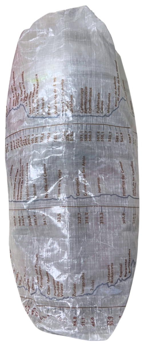 Camino de Santiago Dyneema® Clear Large Rolltop bag with Ultreiatrek design of all the towns and kilometers on the Camino Frances. Gradient is pictured in blue and names are in brown. Side View.