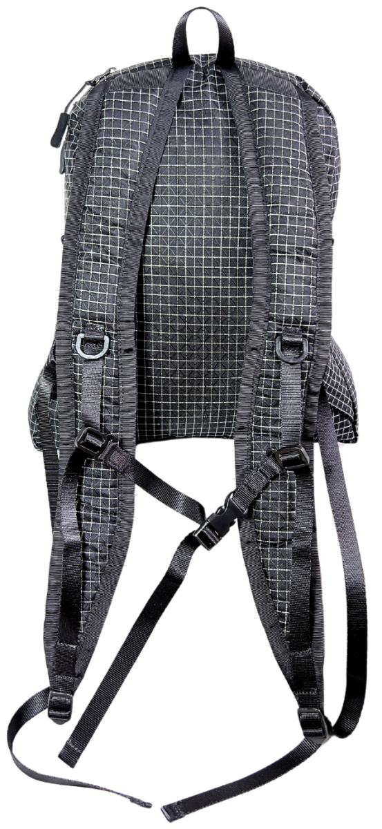 Back of the Mighty Mini Unisex Backpack front. Black fabric with white Dyneema® reinforcement creates rectangular boxes. Shoulder straps with D Rings and Sternum straps.