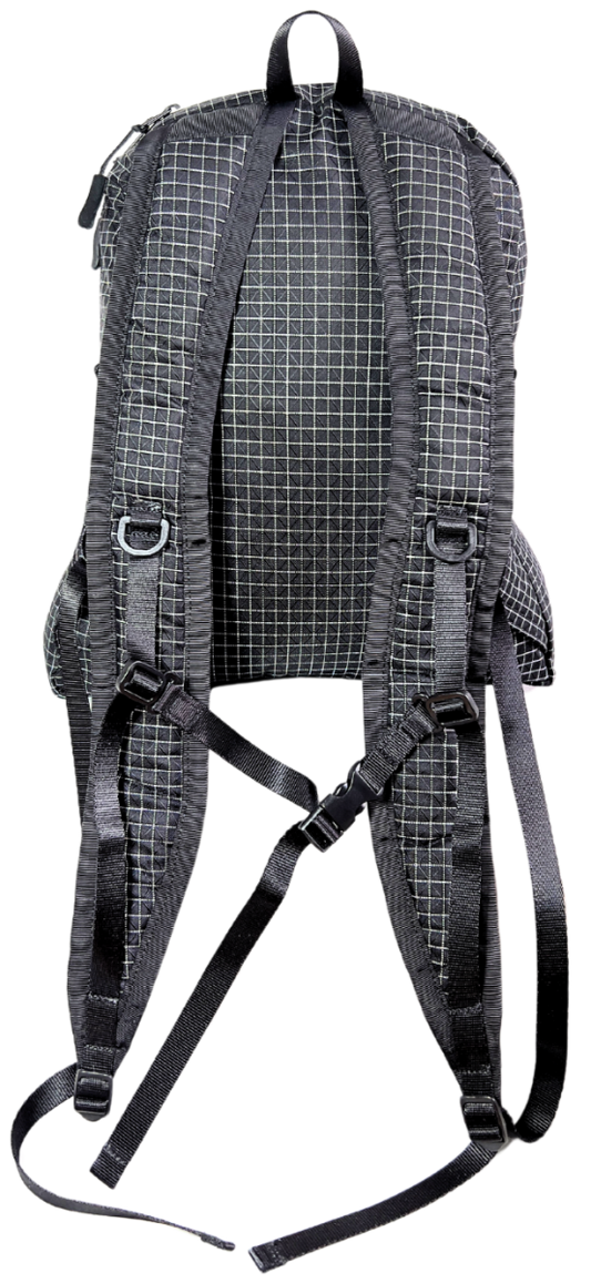 Back of the Mighty Mini Unisex Backpack front. Black fabric with white Dyneema® reinforcement creates rectangular boxes. Shoulder straps with D Rings and Sternum straps.