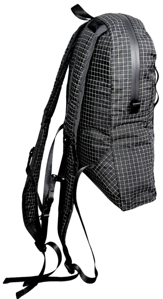 Side view of the Mighty Mini Unisex Backpack front. Black fabric with white Dyneema® reinforcement creates rectangular boxes. Shoulder straps and adjustable bottom straps visible.