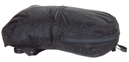 Side View of the unisex MINImalist backpack. It is black in color and made of sheer nylon fabric. 