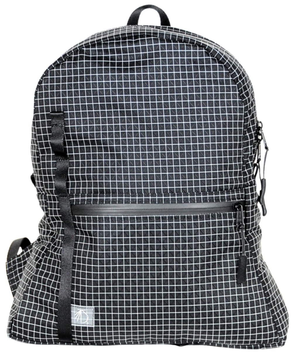 Front View  of the Mighty Mini Unisex Backpack. Black fabric with white Dyneema® reinforcement creates rectangular boxes. Front pocket with matte HHH zipper. Webbing with slots for a handkerchief or carabiner. 